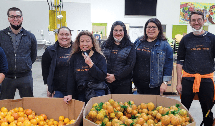 Group of Exelixis employees volunteering at food bank