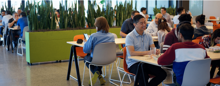 Exelixis employees sitting in cafeteria